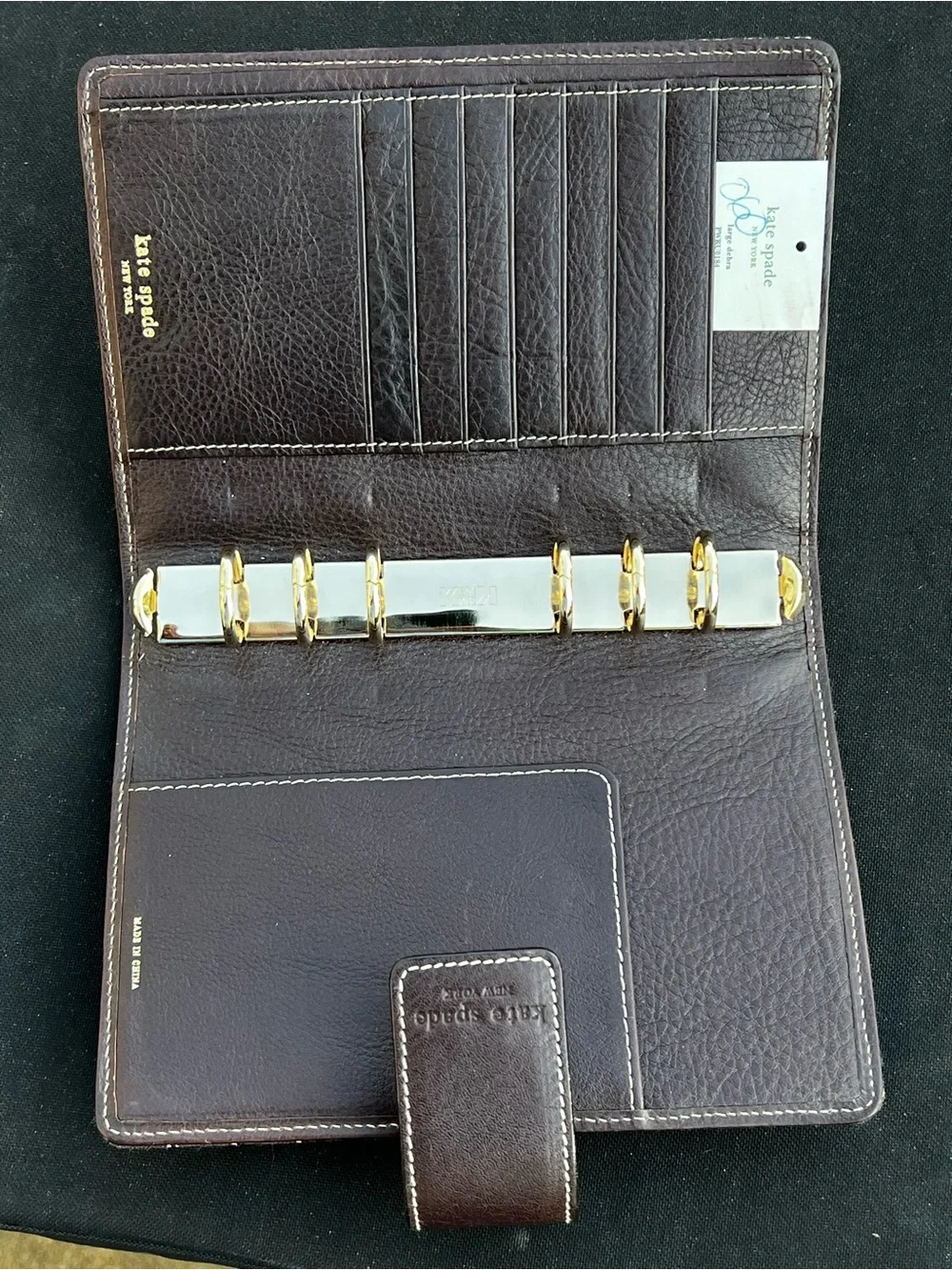 kate spade brown tablet folio with orange and cream stripe